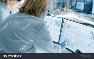 stock-photo-senior-female-scientist-discusses-scientific-data-with-her-laboratory-assistant-they-re-looking-at-1073659376
